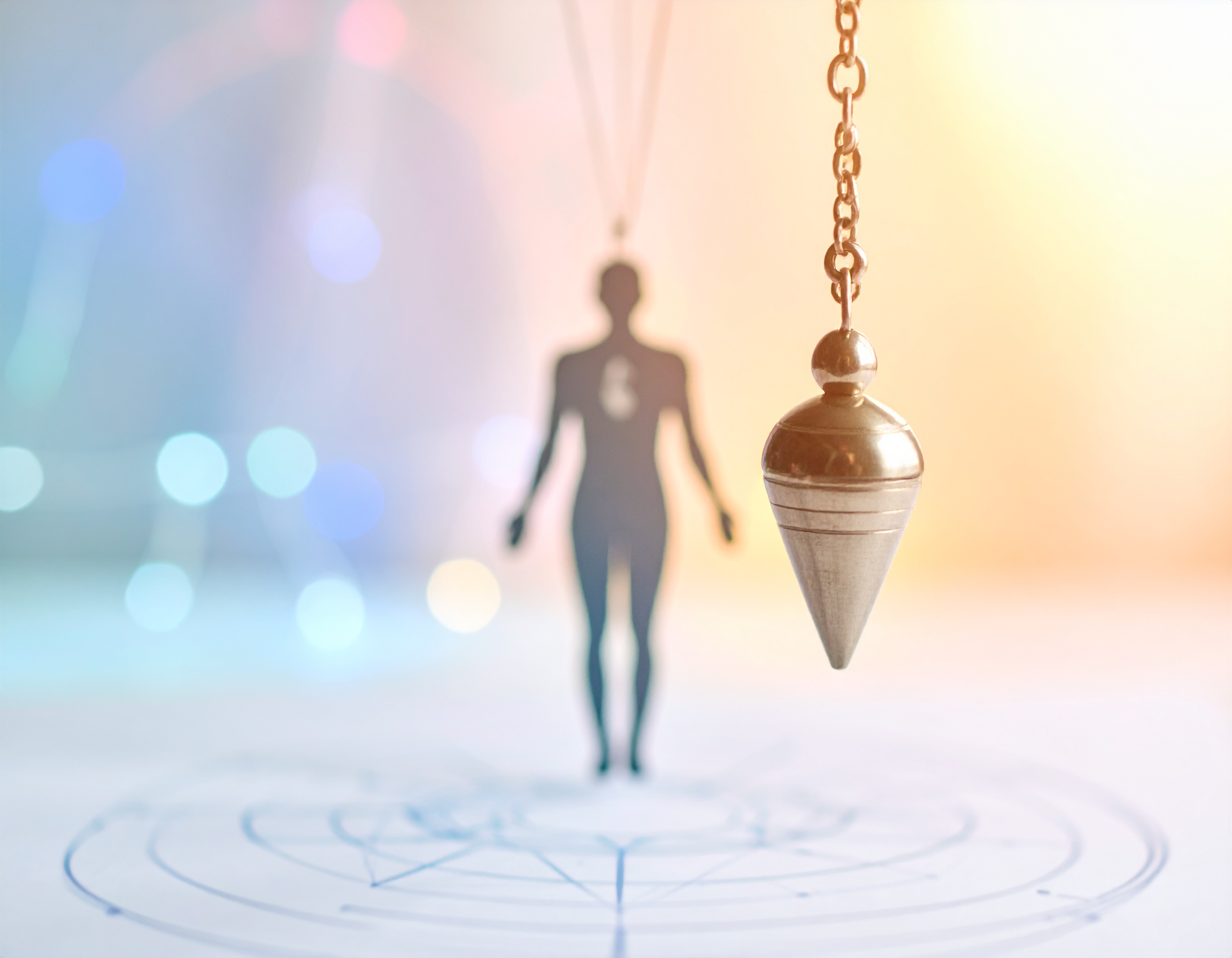 Limpieza energética a distancia con péndulo - The Healing Project